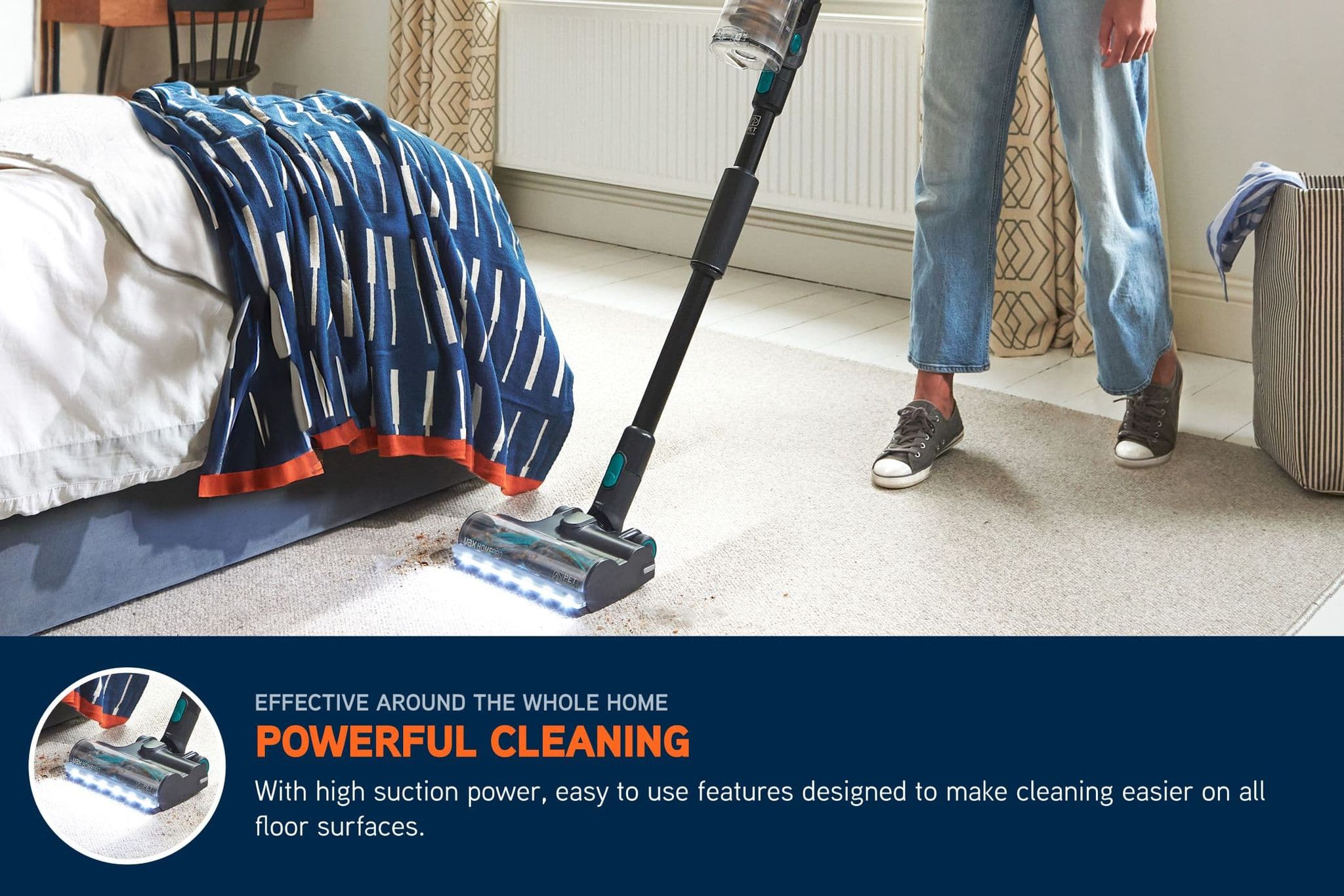 Cordless HomePro Detect Pet-Design vacuum cleaner pulling up stains and crumbs off of a bedroom carpet