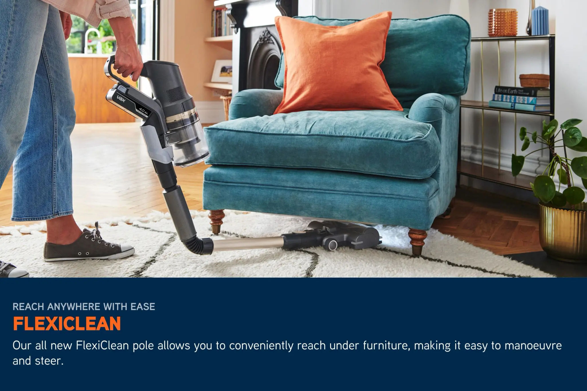 Cordless HomePro Pet vacuum pole bending underneath a chair to clean dirt, with LED lights illuminating the floor beneath