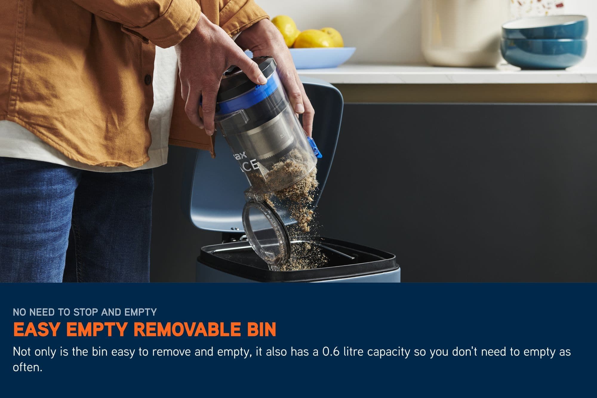 Pace Cordless Vacuum cleaning up a large spilt mess off of the carpet using boost mode. Text reads: boost mode for tougher clean up jobs, select Boost Mode for additional suction power. 