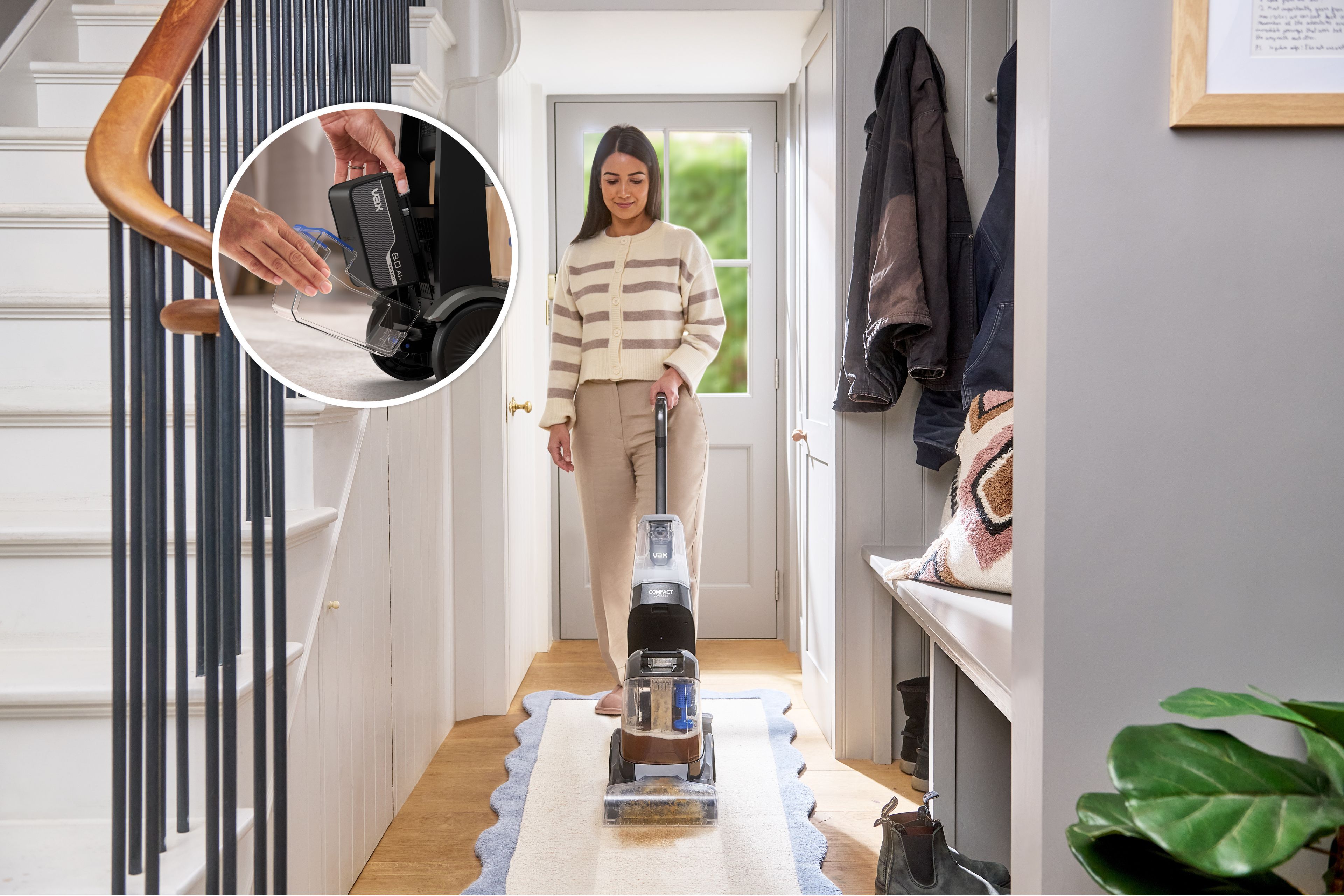 8.0Ah removable battery being inserted into the VAX ONEPWR Compact Cordless Carpet Cleaner for cordless runtime.