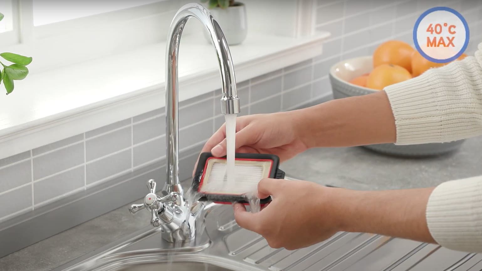 Rinse the filter under the tap