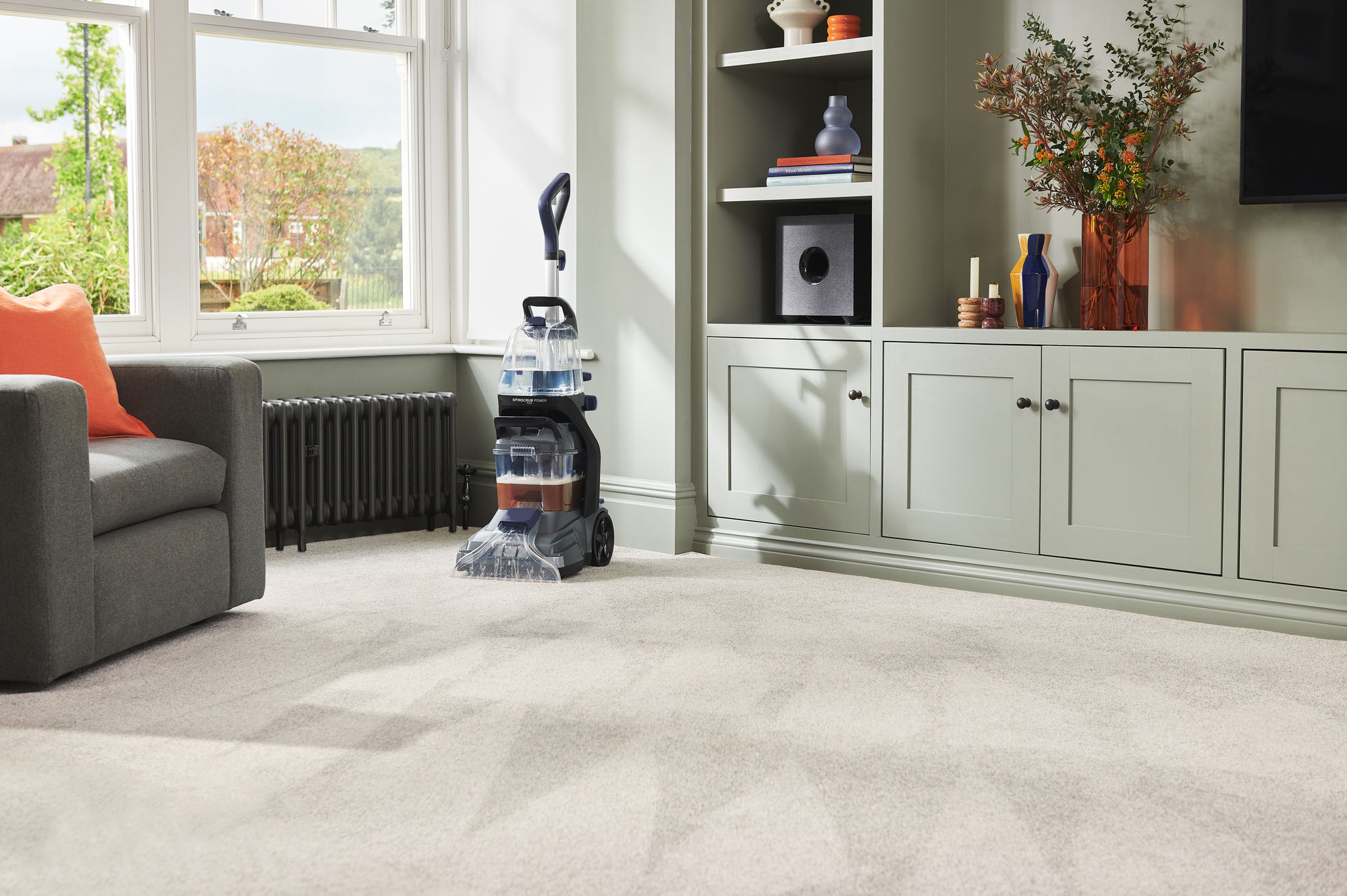 VAX SpinScrub Power Plus Carpet Cleaner self standing on a carpet 