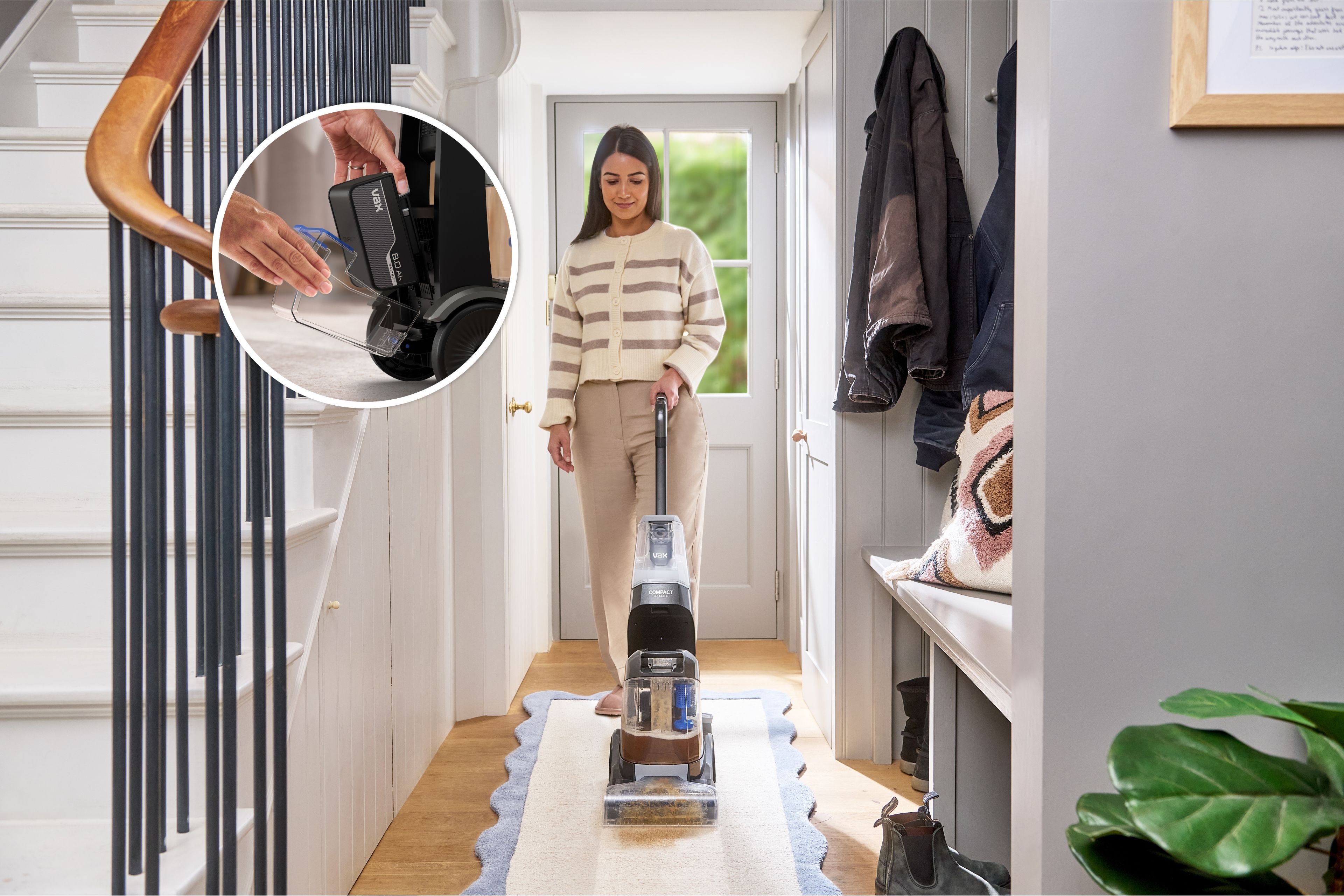 8.0Ah removable battery being inserted into the VAX ONEPWR Compact Cordless Carpet Cleaner for cordless runtime.